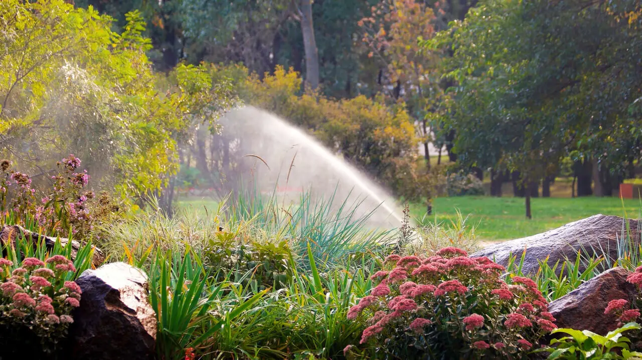 How does the garden sprinkler system work