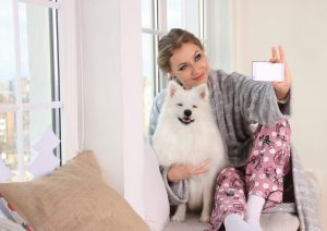 Woman with white dog